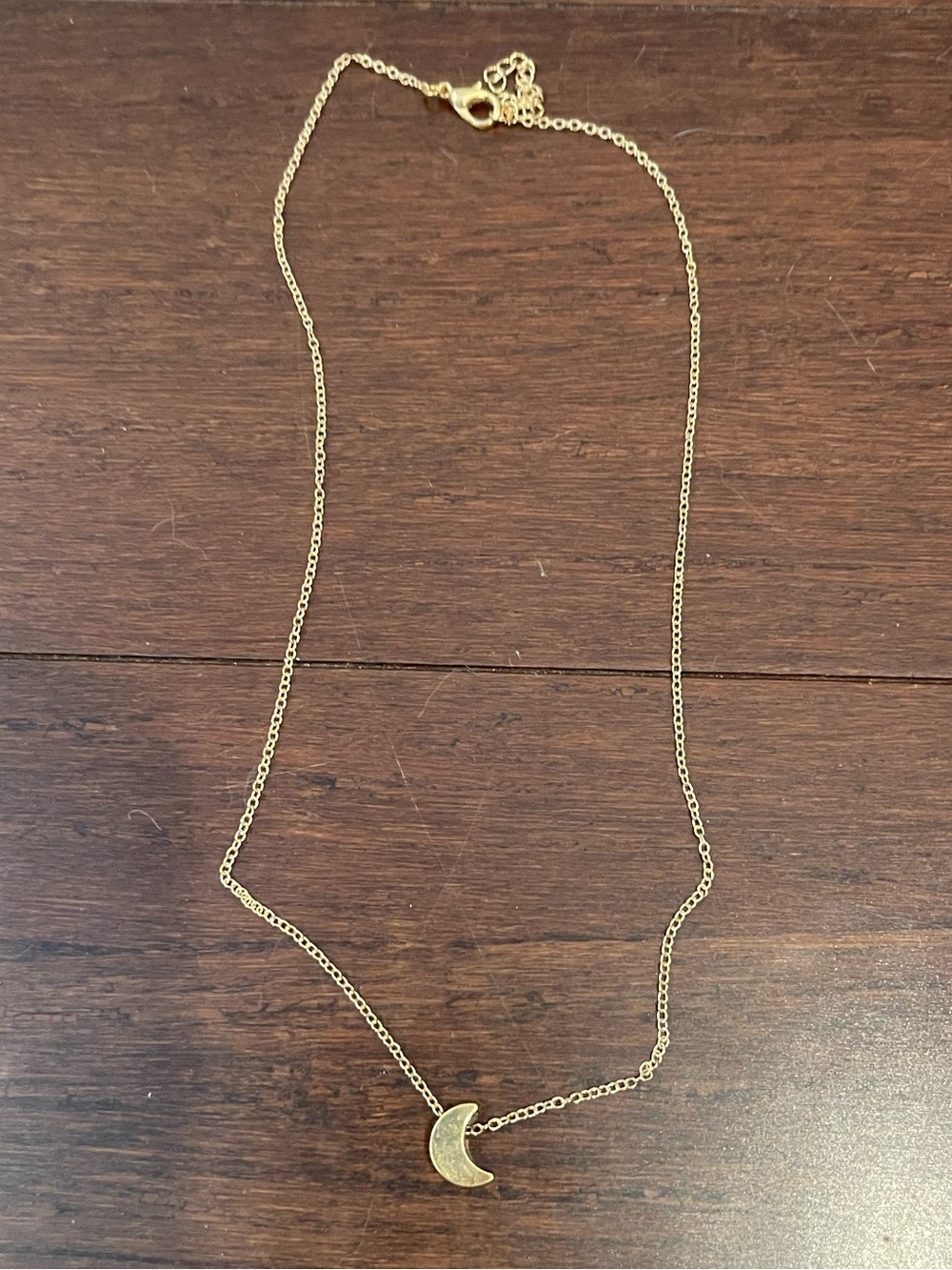 Gold color moon charm necklace